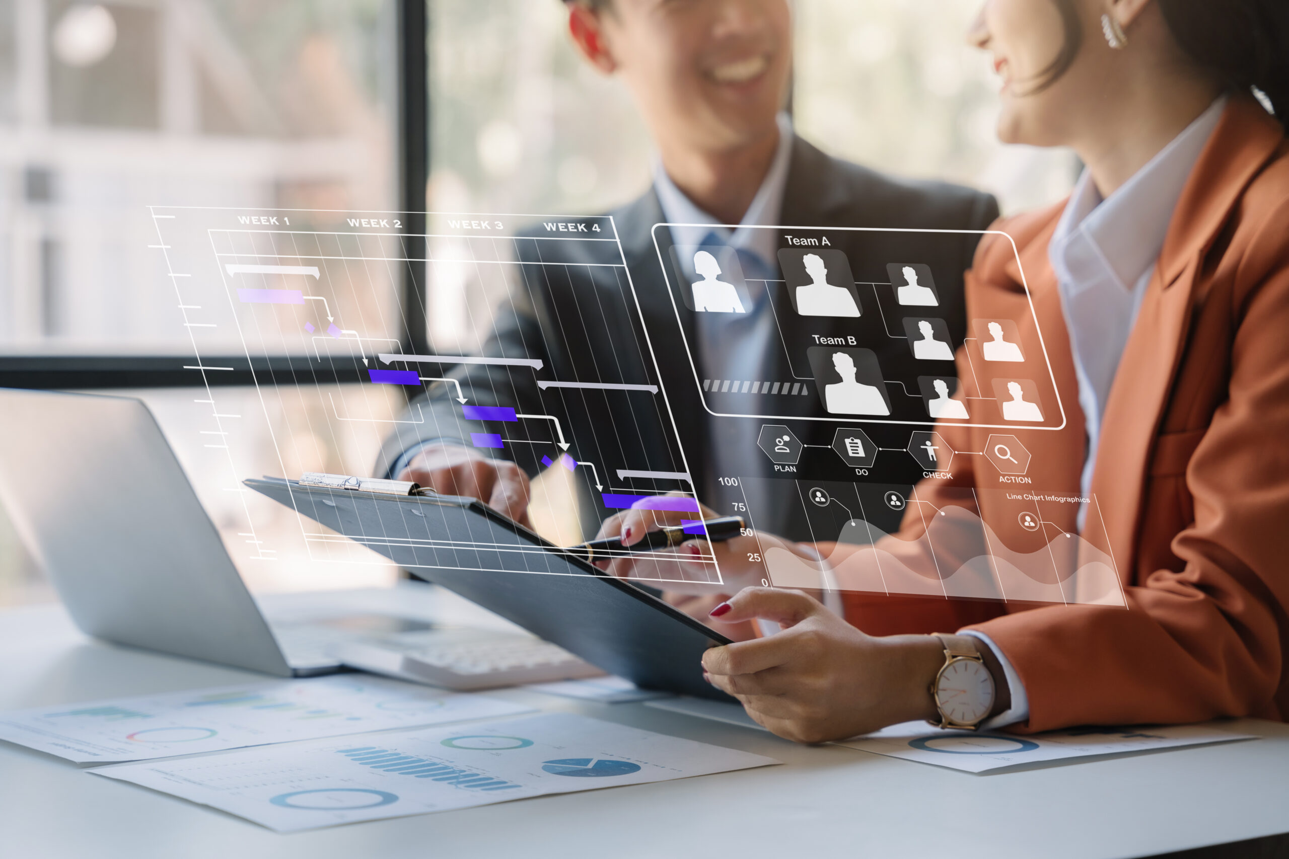 Business team hand Project manager working and update tasks and Gantt chart scheduling virtual diagram with tablet and laptop in office.